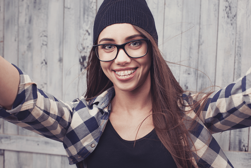 Hipster girl with braces e1490029164546